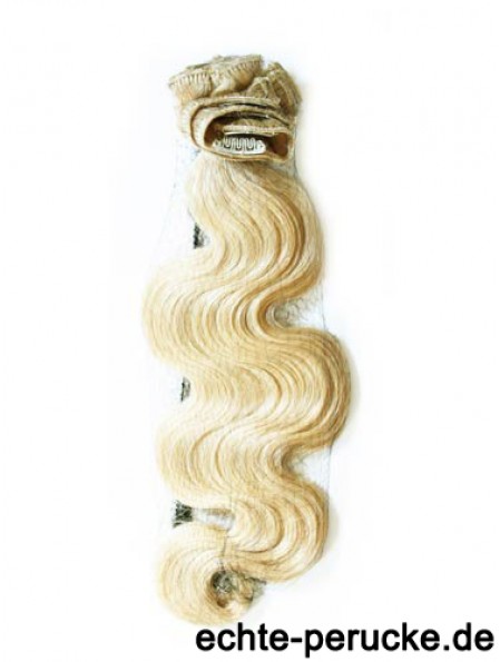 Stilvolle blonde wellige Remy Echthaar-Clip in Haarverlängerungen